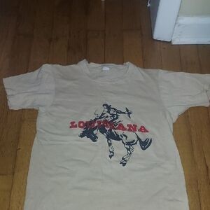 Beige Graphic T-Shirt. Closet of Mariah Harmony of Pit Bulls and Paroles TV show